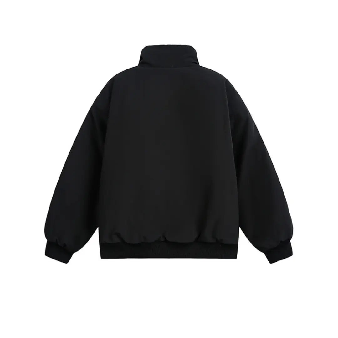 Black jacket shown from the back on a white background