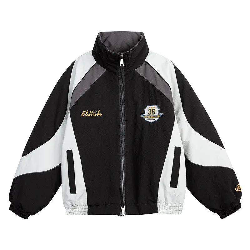 Black and white jacket with branding on a white background